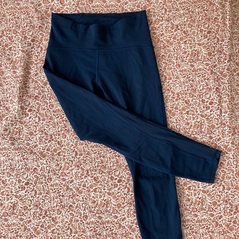 Lululemon leggings with mesh lower legs.
